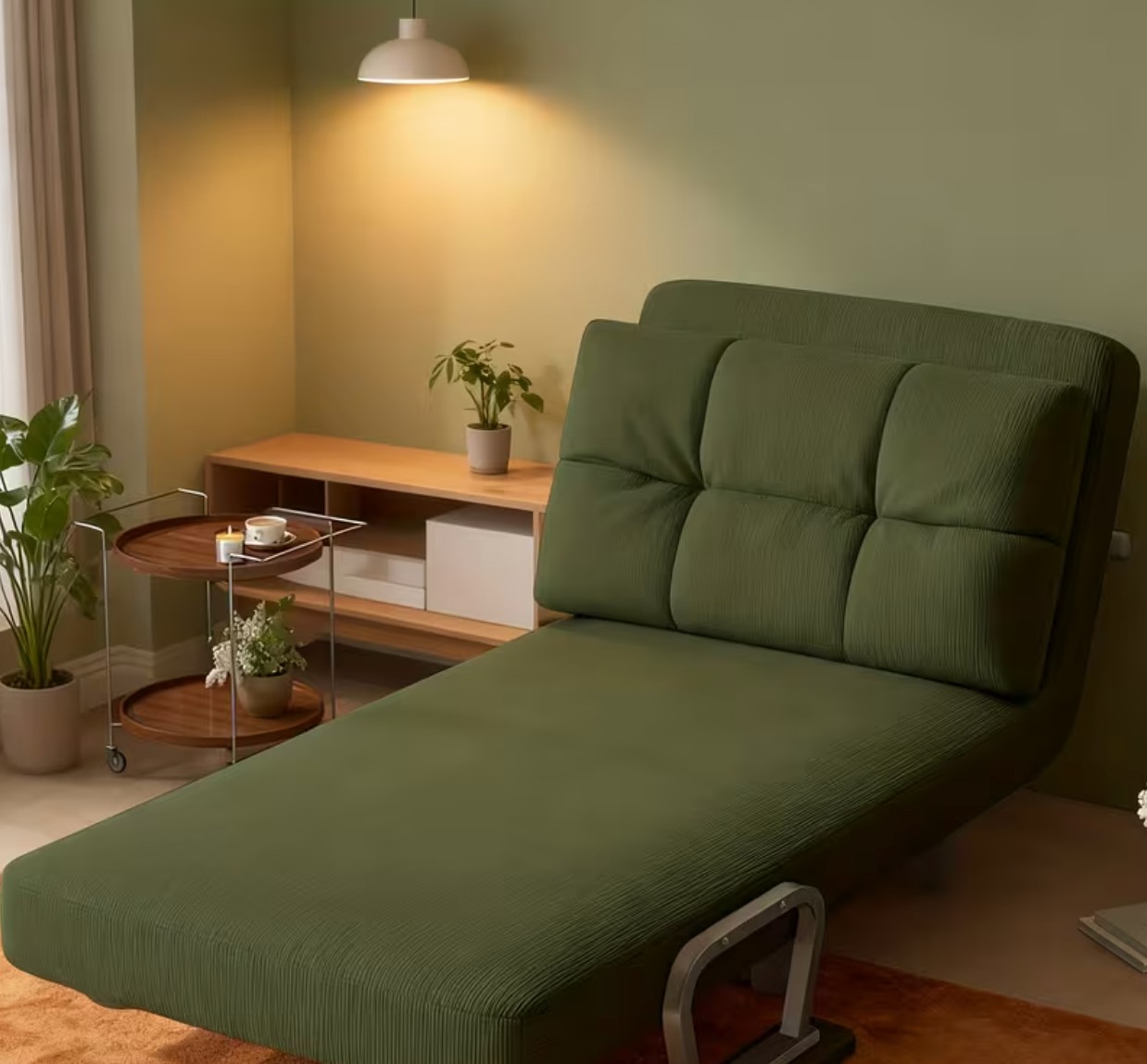 Sofá-cama aberto como cama individual num quarto